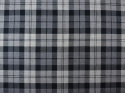wełna w szarą kratę tartan