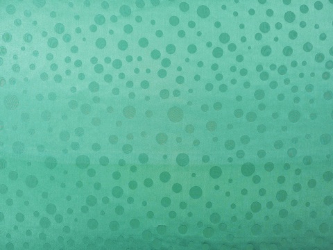 jedwab wytłaczany w groszki w kolorze miętowym