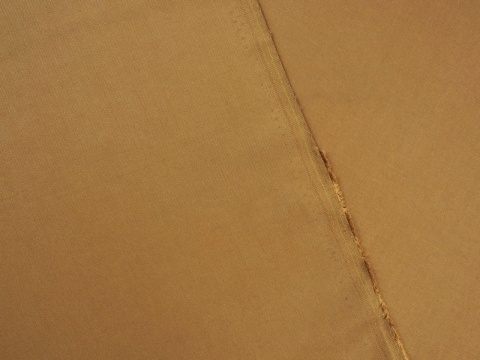 tencel w kolorze ciemnego beżu