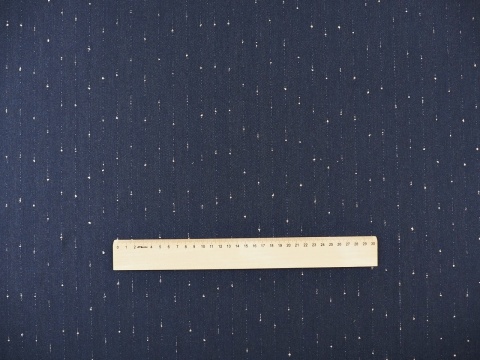 granatowa tkanina w pionowe, delikatne, złote paski