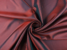 czerwona podszewka w trójkąty opalizująca na zielono