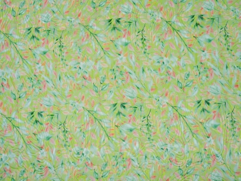 jedwab z wiskozą devore w zielone i brzoskwiniowe listki