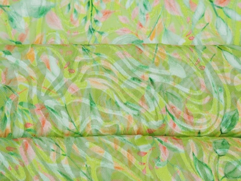 jedwab z wiskozą devore w zielone i brzoskwiniowe listki