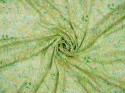 jedwab z wiskozą devore w zielone i brzoskwiniowe listki