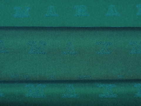 zielona podszewka z sygnaturą