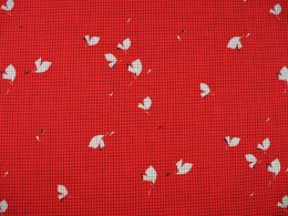 czerwona wełna w drobną kratkę i szare listki