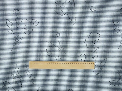 wełna w biało-niebieską, drobną kratkę i czarne szkice kwiatów