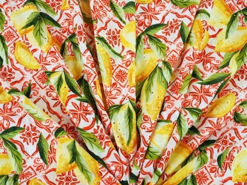 bawełna ażurowa w cytryny i czerwone ornamenty na białym tle