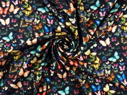czarna wiskoza w drobne, kolorowe motyle gęsto rozmieszczone