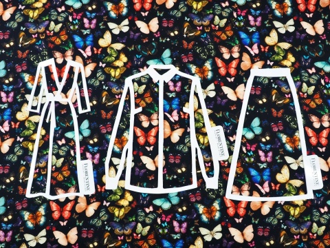 czarna wiskoza w drobne, kolorowe motyle gęsto rozmieszczone