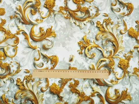 jedwab w złote ornamenty na białym tle