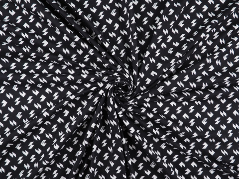 Dzianina sygnowana - Geometryczne wzory na czerni Dzianina sygnowana - Geometryczne wzory na czerni