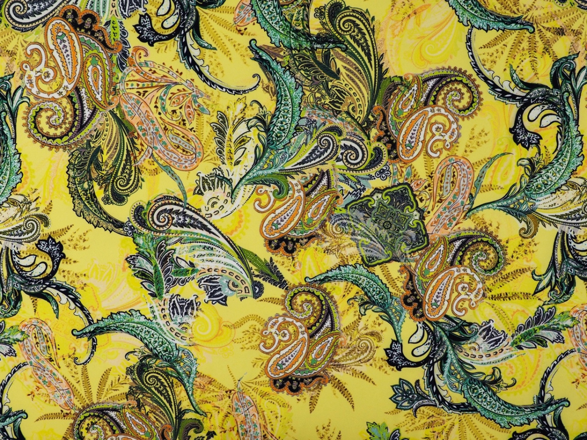 Lycra dzianina - Kolorowe paisley na kanarkowym tle Lycra dzianina - Kolorowe paisley na kanarkowym tle