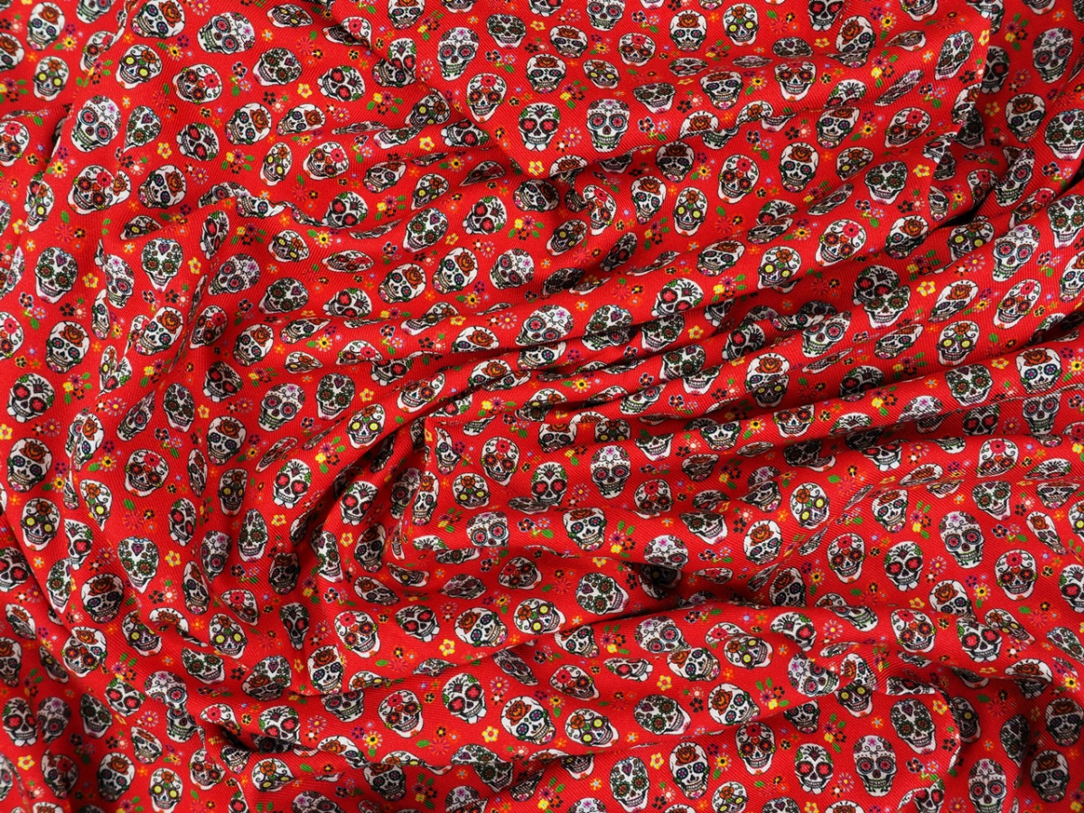 Wiskoza twill - Czaszki na czerwieni Wiskoza twill - Czaszki na czerwieni