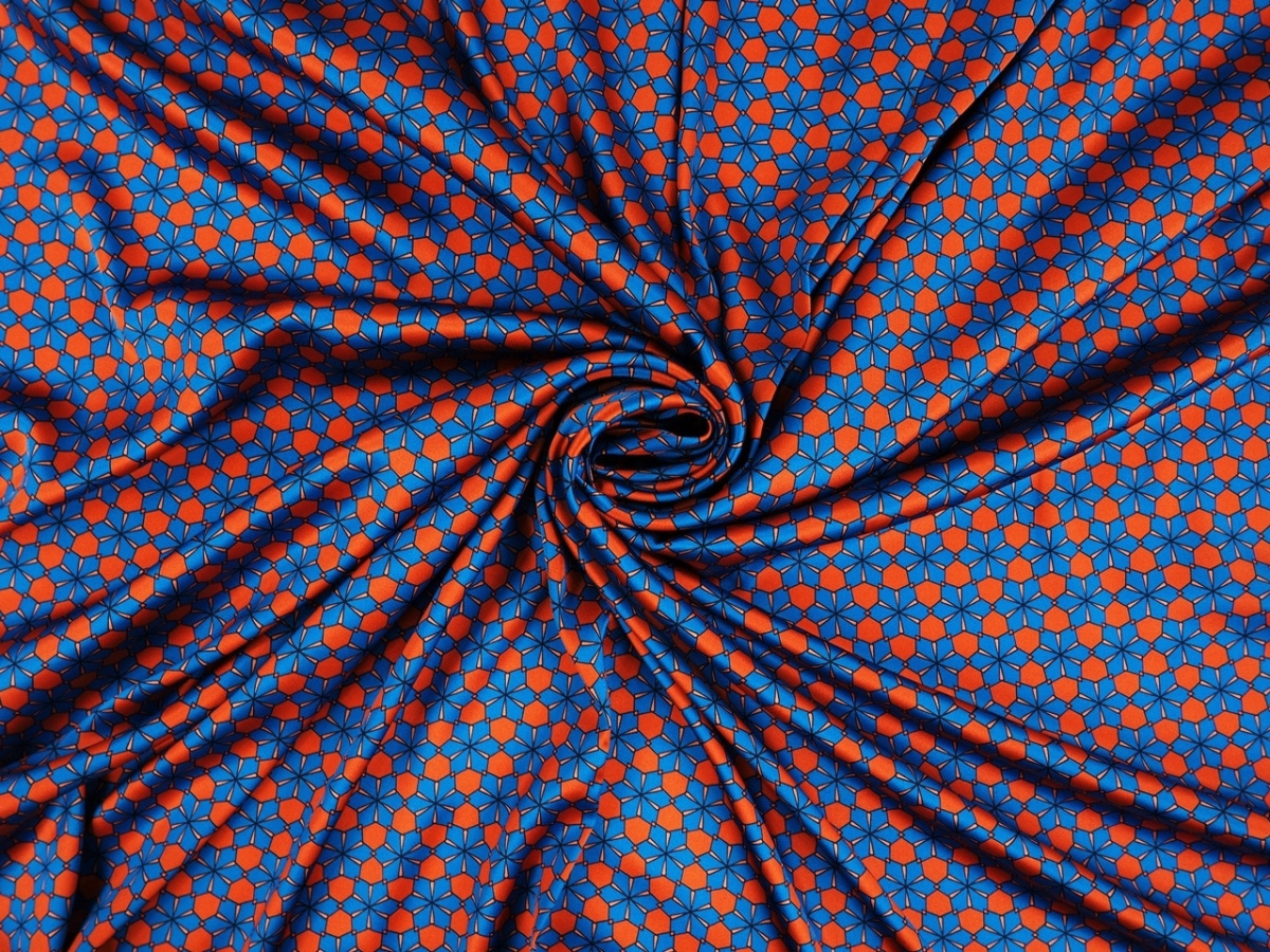 Jedwab elastyczny - Niebieskie wzory geometryczne Jedwab elastyczny - Niebieskie wzory geometryczne