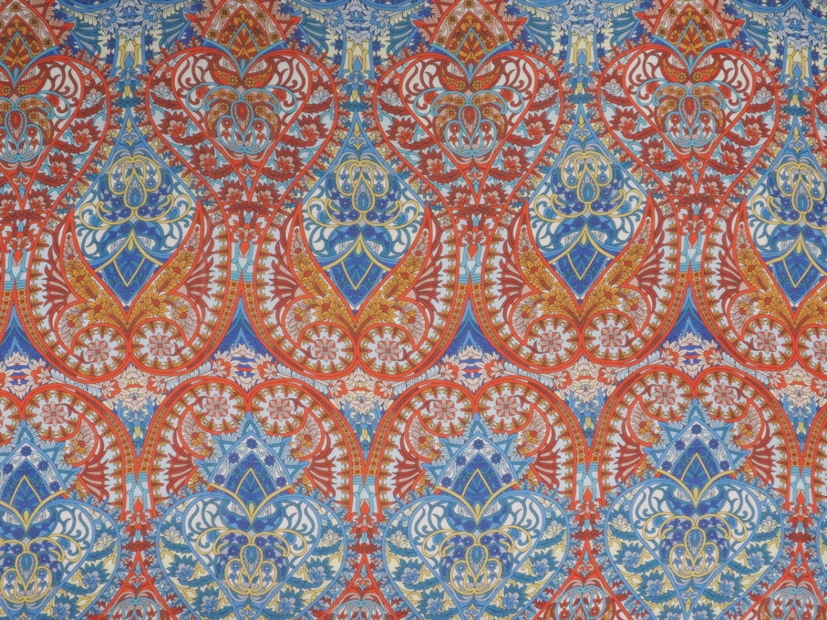 Jedwab szyfon - Pomarańczowe i niebieskie ornamenty