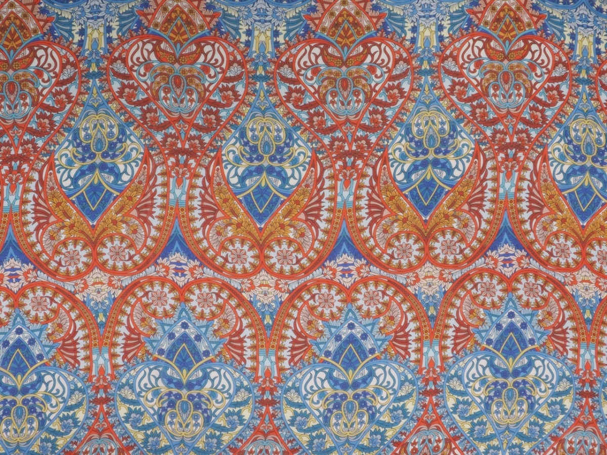 Jedwab szyfon - Pomarańczowe i niebieskie ornamenty Jedwab szyfon - Pomarańczowe i niebieskie ornamenty