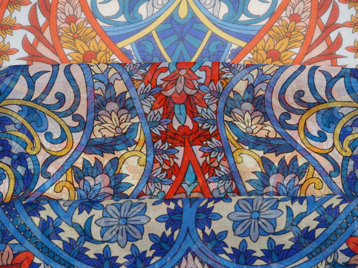 Jedwab szyfon - Pomarańczowe i niebieskie ornamenty Jedwab szyfon - Pomarańczowe i niebieskie ornamenty