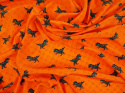 Jedwab naturalny - Dinozaury na pomarańczowym tle
