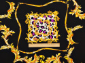 czarny jedwab w złote paski i ornamenty oraz panterka z fioletem