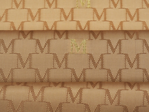 sygnowana podszewka ciemne złoto