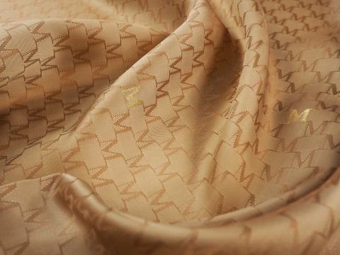 sygnowana podszewka ciemne złoto