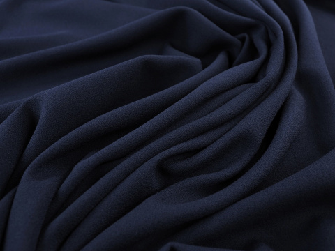 krepa wełniana w kolorze ciemnym granatowym