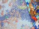 błękitna dzianina wiskozowa w modne, morskie motywy - muszle, koralowce, rozgwiazdy