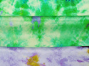 zielony jedwab satynowy z motywem tie dye